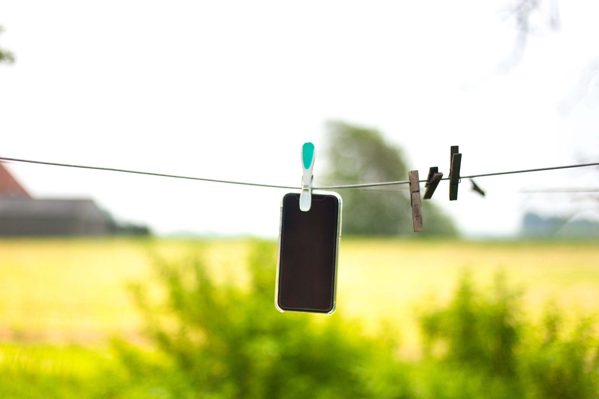 Smart Phone Hanging on Laundry Line