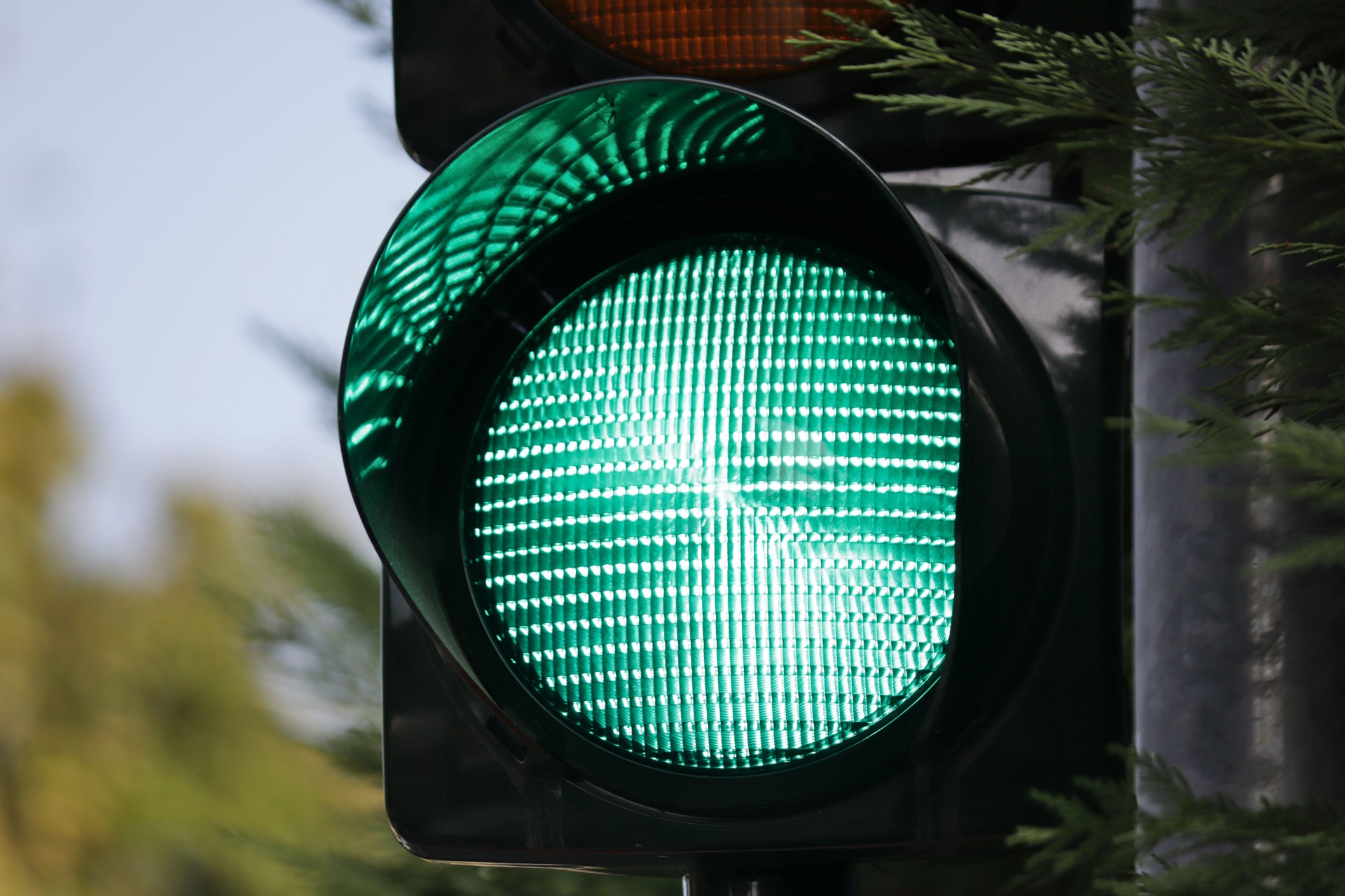 Close-up on a traffic light green light